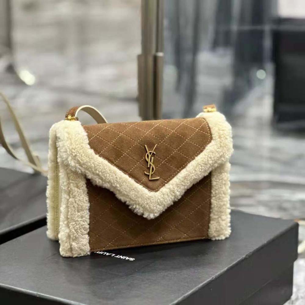 Side profile of brown Saint Laurent YSL Women Gaby Satchel with flap closure