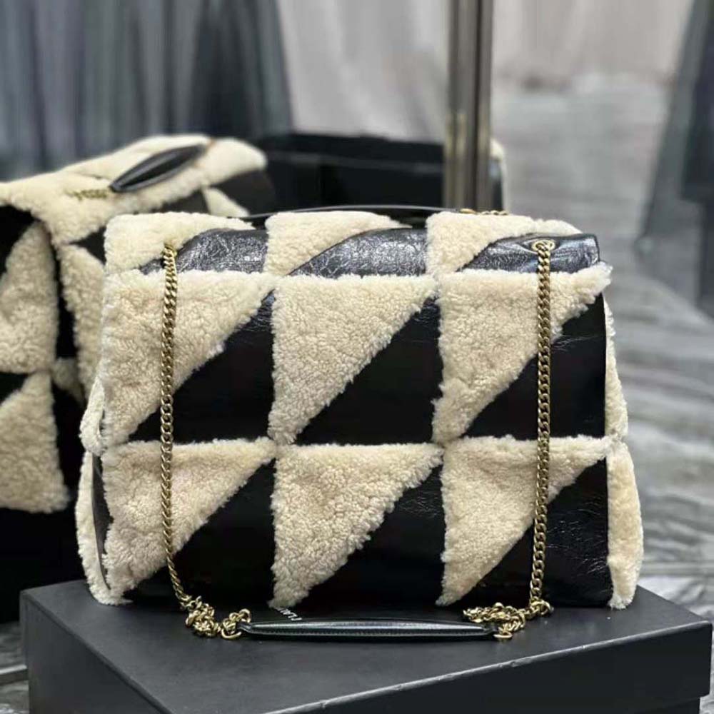 Side angle showing suede and shearling contrast on Saint Laurent Jamie Giant Chain Bag