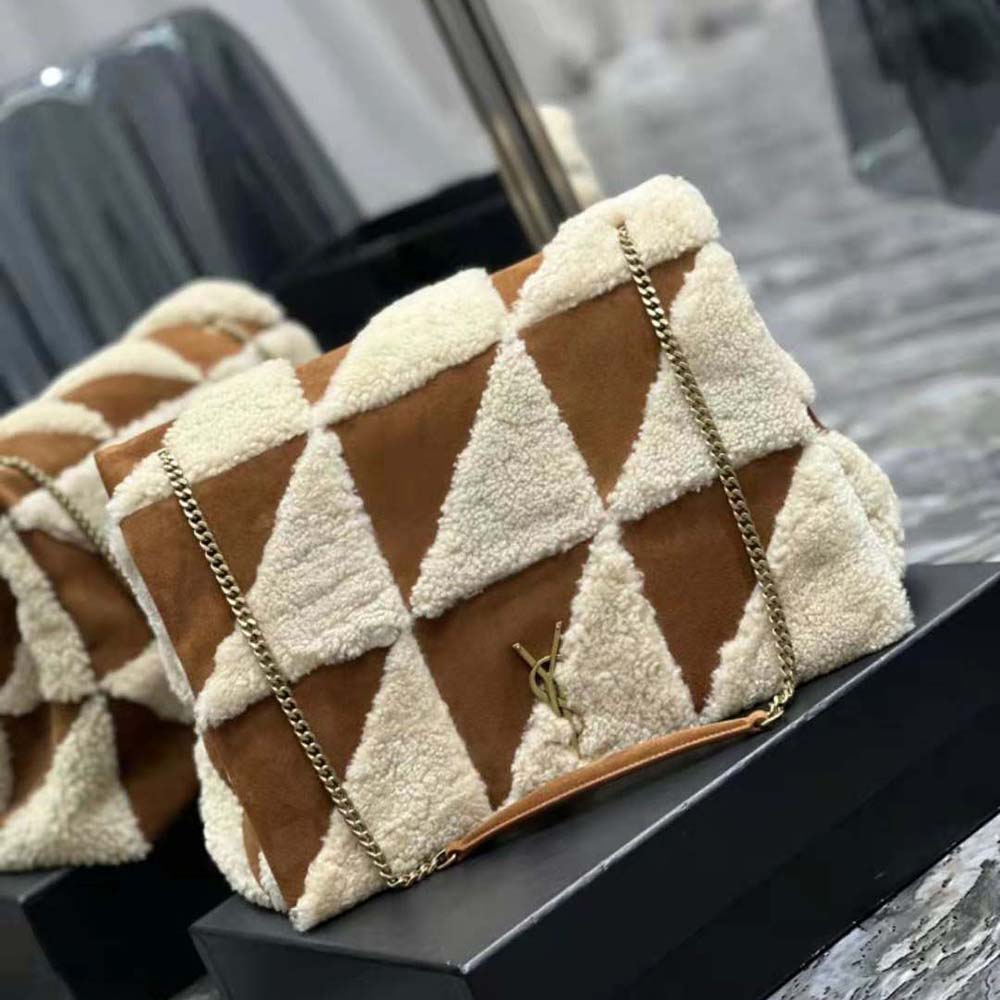 Side angle showcasing suede and shearling texture on Saint Laurent YSL shoulder bag