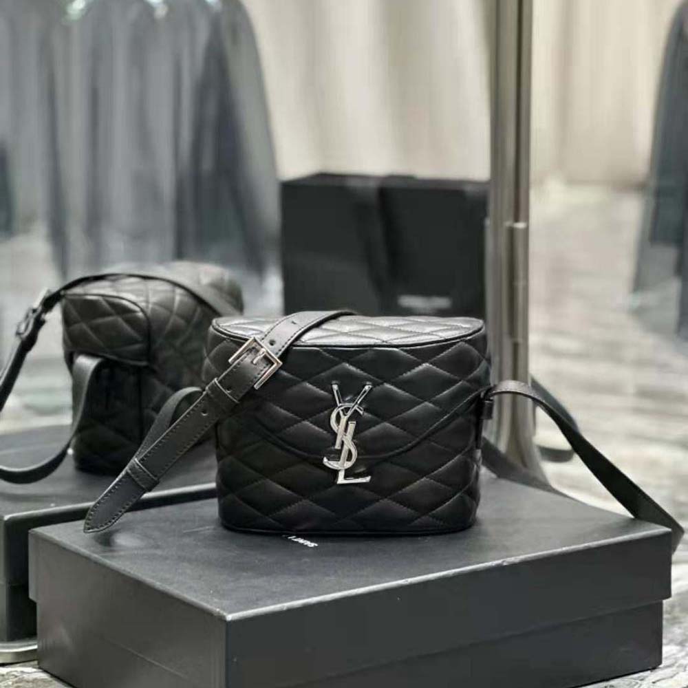 Close-up of gold YSL logo hardware on June Box Bag quilting detail