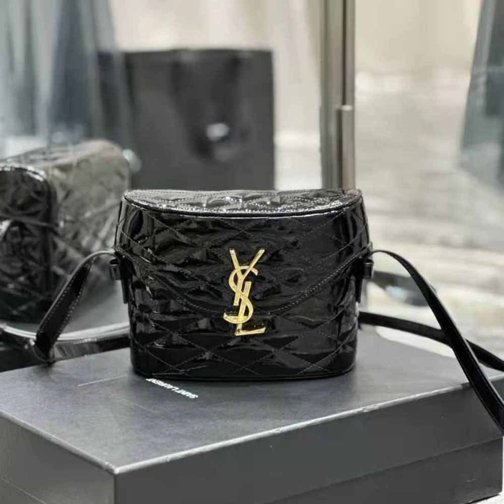 Close-up of gold YSL logo and quilting on June Box Bag