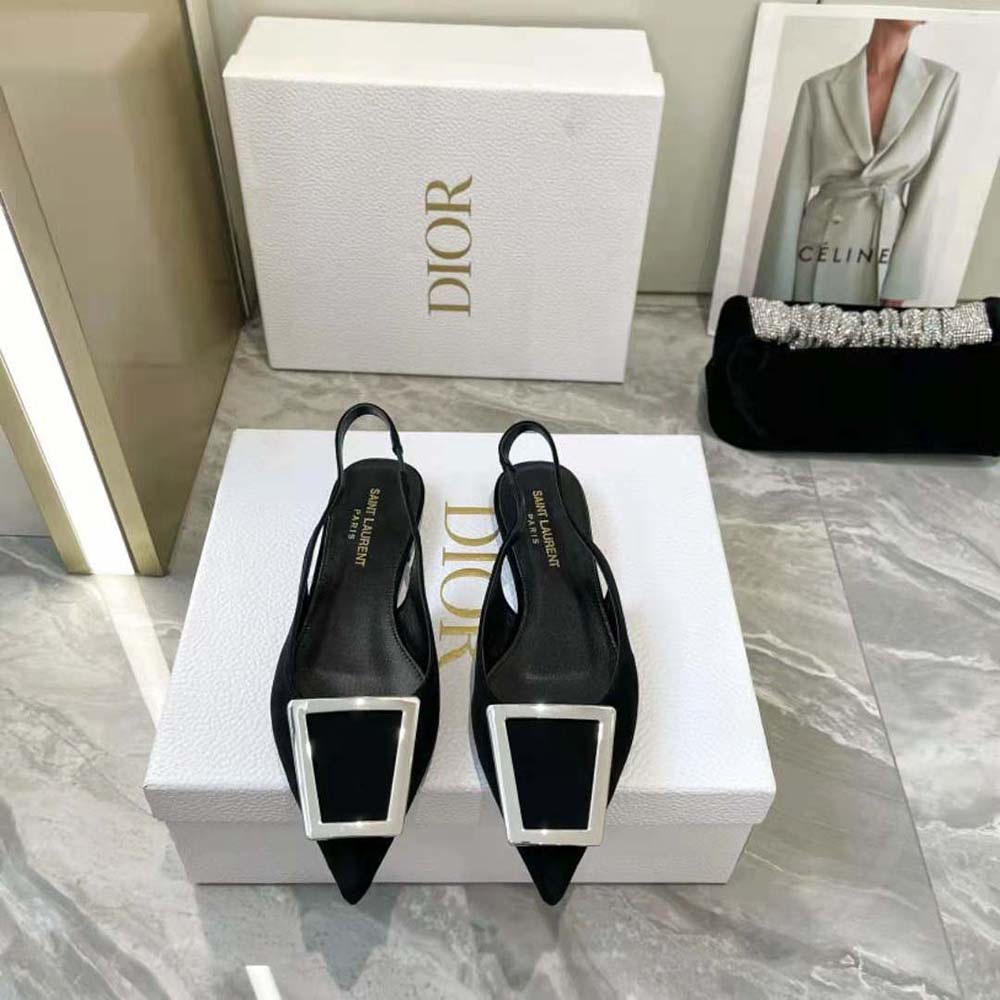 Close-up of YSL logo hardware on Maxine Slingback Flats