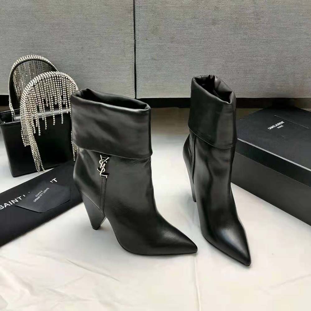 Rear view showing stacked heel on Saint Laurent YSL Women Niki Booties