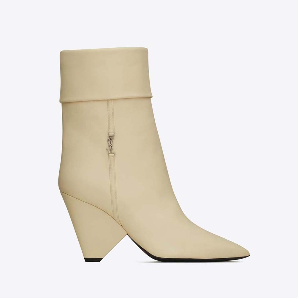 Side view of Saint Laurent YSL Women Niki Booties in smooth white leather