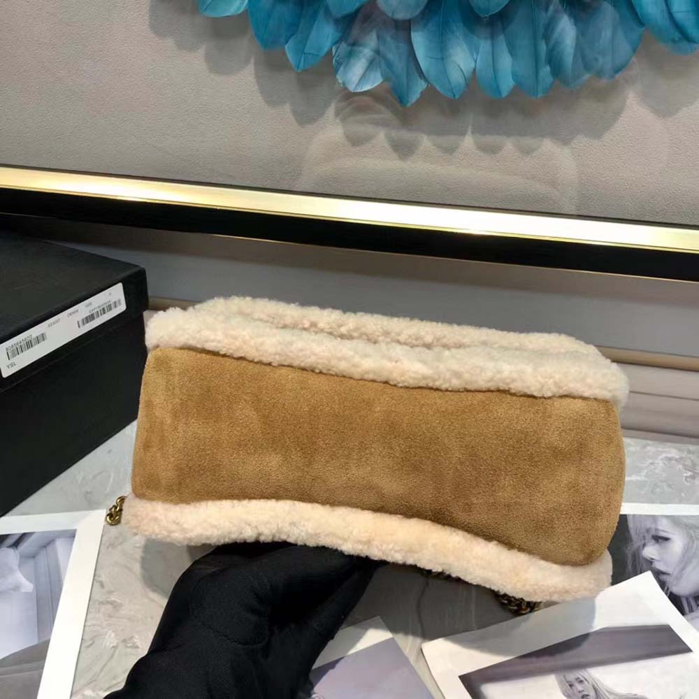 Side angle showcasing crinkled leather texture on Saint Laurent YSL chain bag