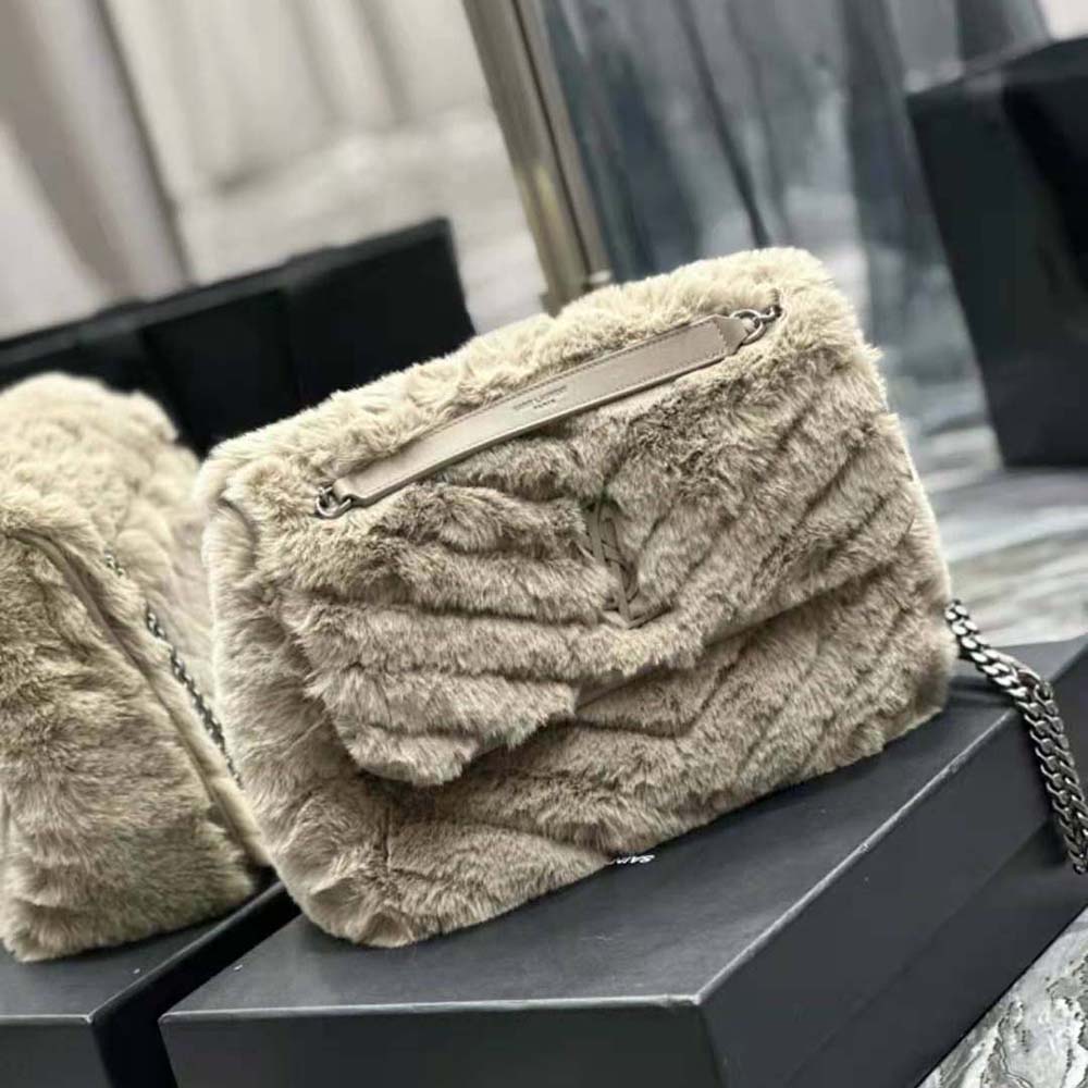 Side angle showing soft shearling texture on Saint Laurent YSL Niki bag