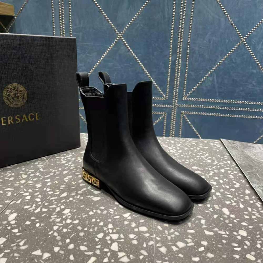 Top angle showing elastic panels on Versace Women Greca Chelsea Boots