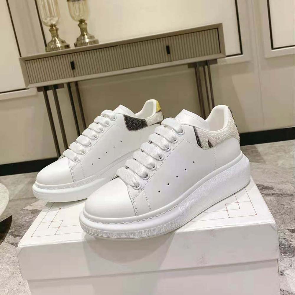 Close-up on chunky sole and leather texture of Alexander Mcqueen Women Oversized Sneaker