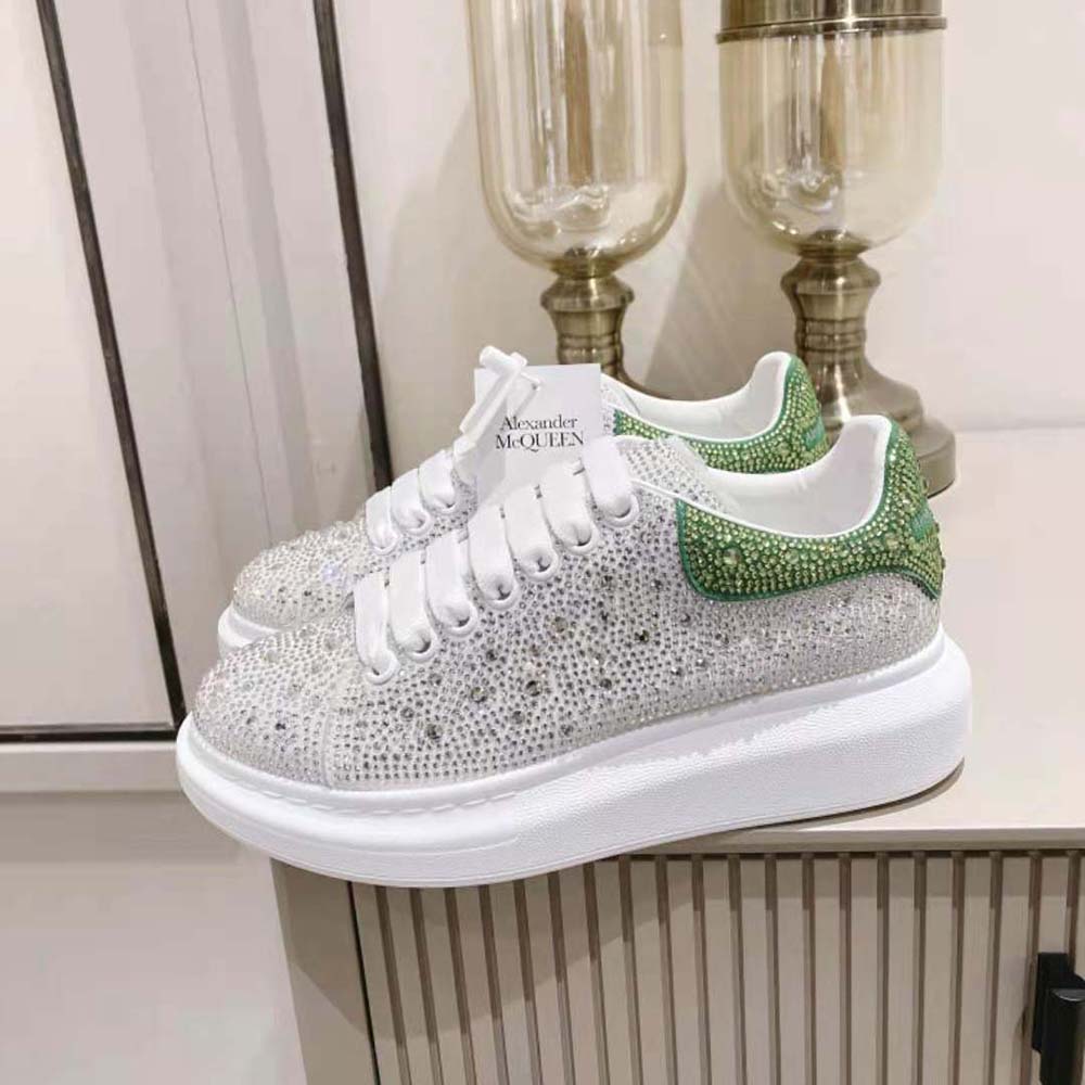 Top angle showing oversized sole and leather on Alexander Mcqueen Women Oversized Sneaker
