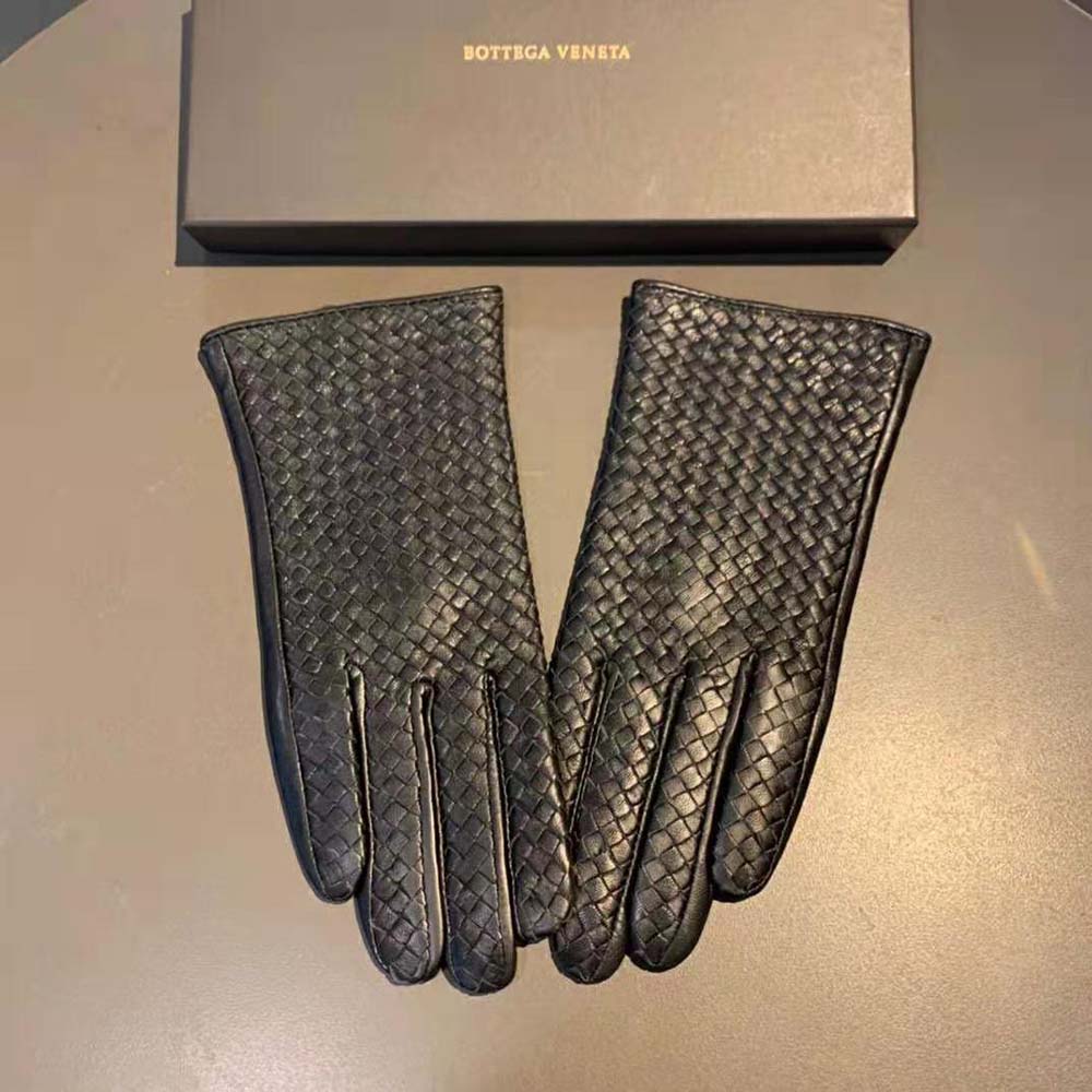 Close-up of intrecciato leather weave detail on gloves