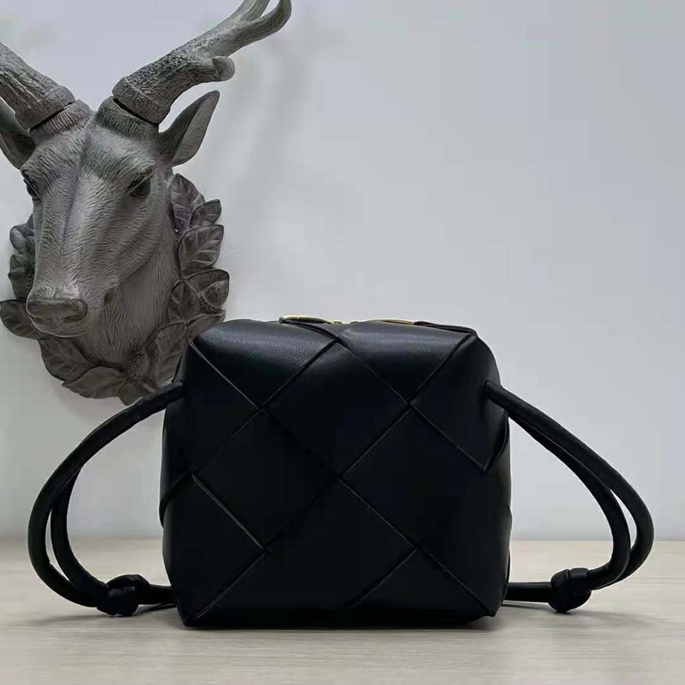 Close-up of matte black hardware on Bottega Veneta Women Mini Cassette Camera Bag-Black