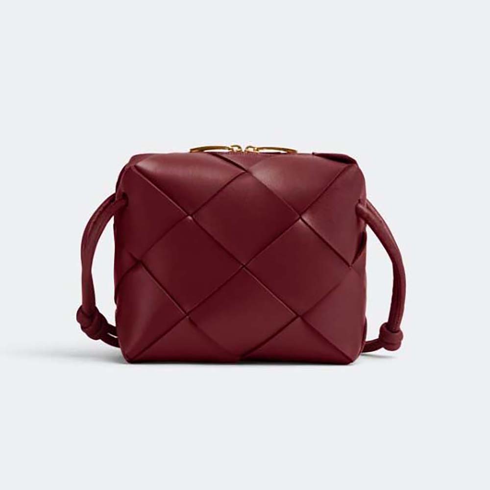 Front view of Bottega Veneta Women Mini Cassette Camera Bag-Maroon showcasing intrecciato weave