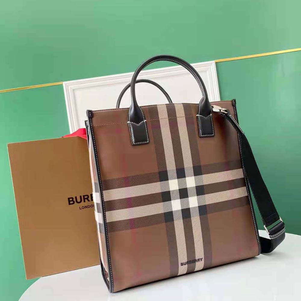 Side profile showing slim silhouette of Burberry Men Exaggerated Check and Leather Slim Tote-Brown