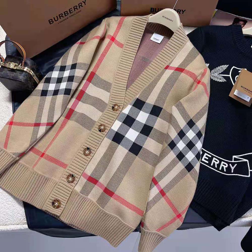 Close-up detail of Burberry check jacquard pattern on cardigan sleeve