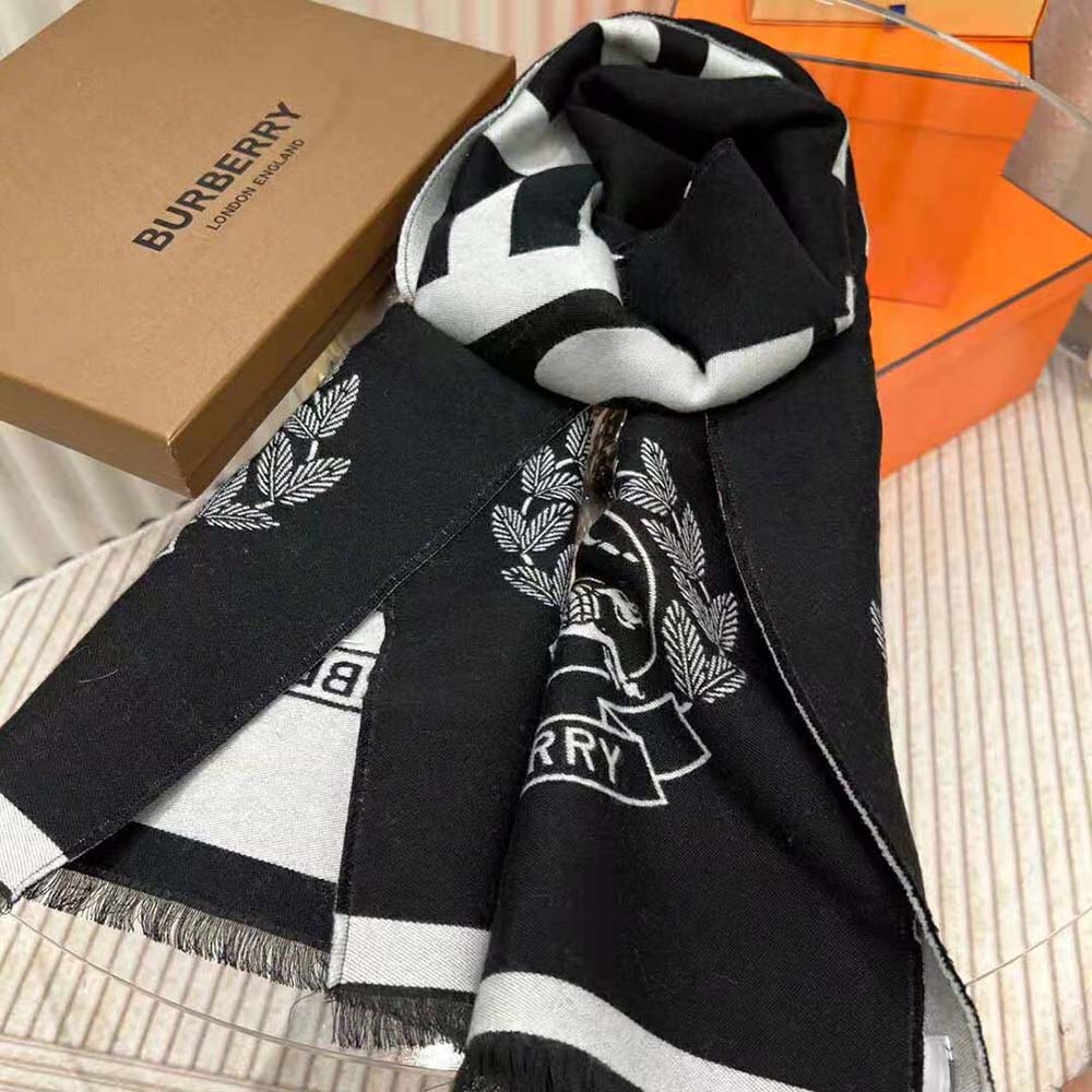 Side angle showing texture and weave of Burberry Women Logo and EKD Wool Silk Jacquard Scarf-Black