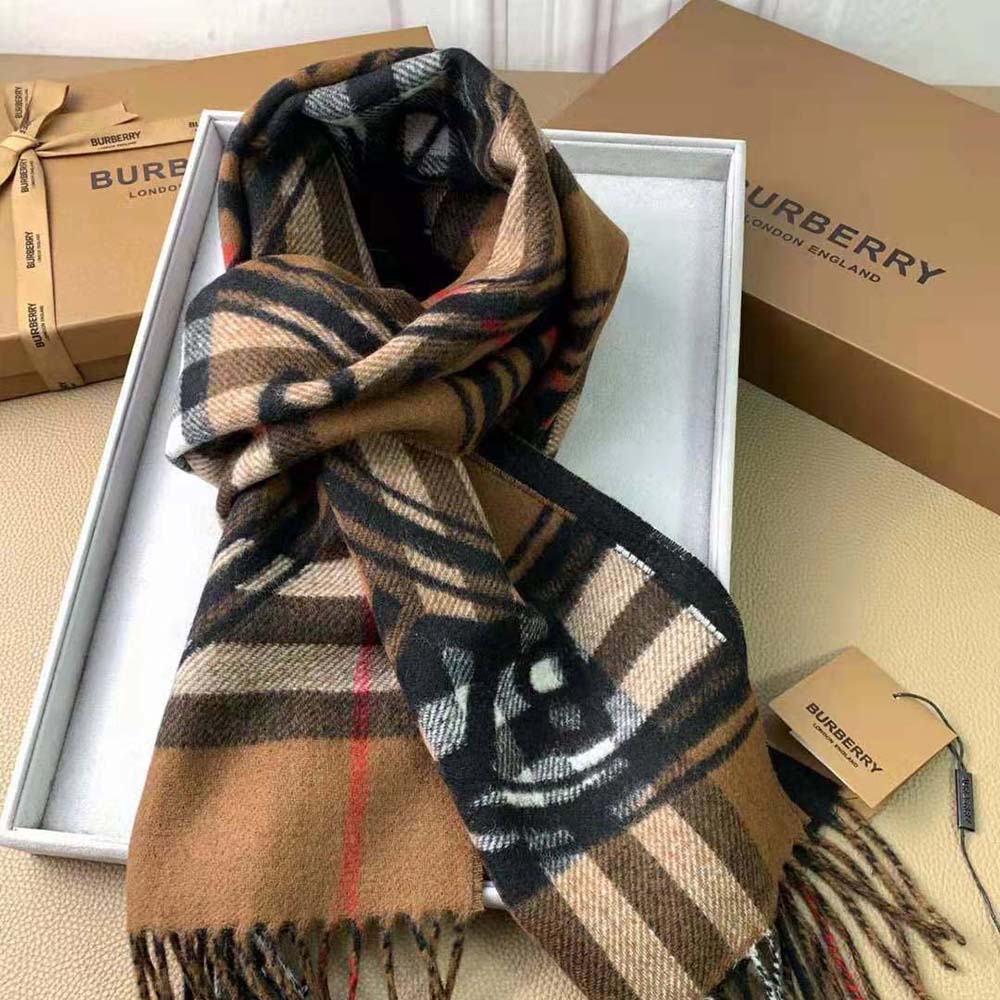 Close-up detail of montage print and texture on Burberry scarf