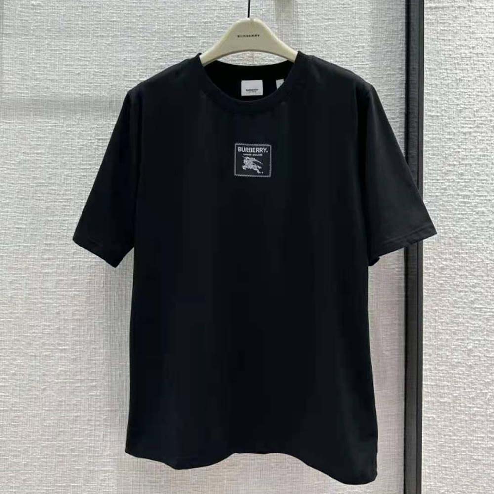 Close-up of cotton fabric texture and Prorsum label on black T-shirt