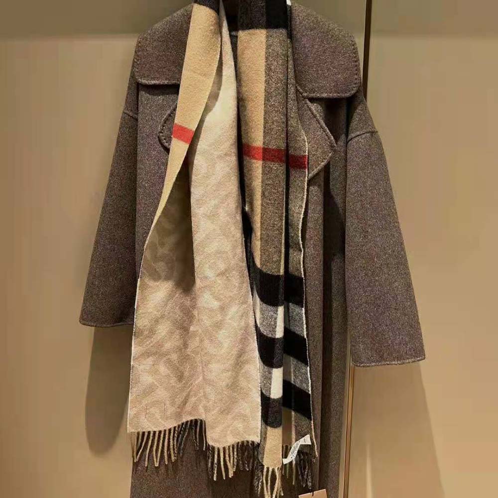 Side angle showing the length and fringe of Burberry reversible scarf