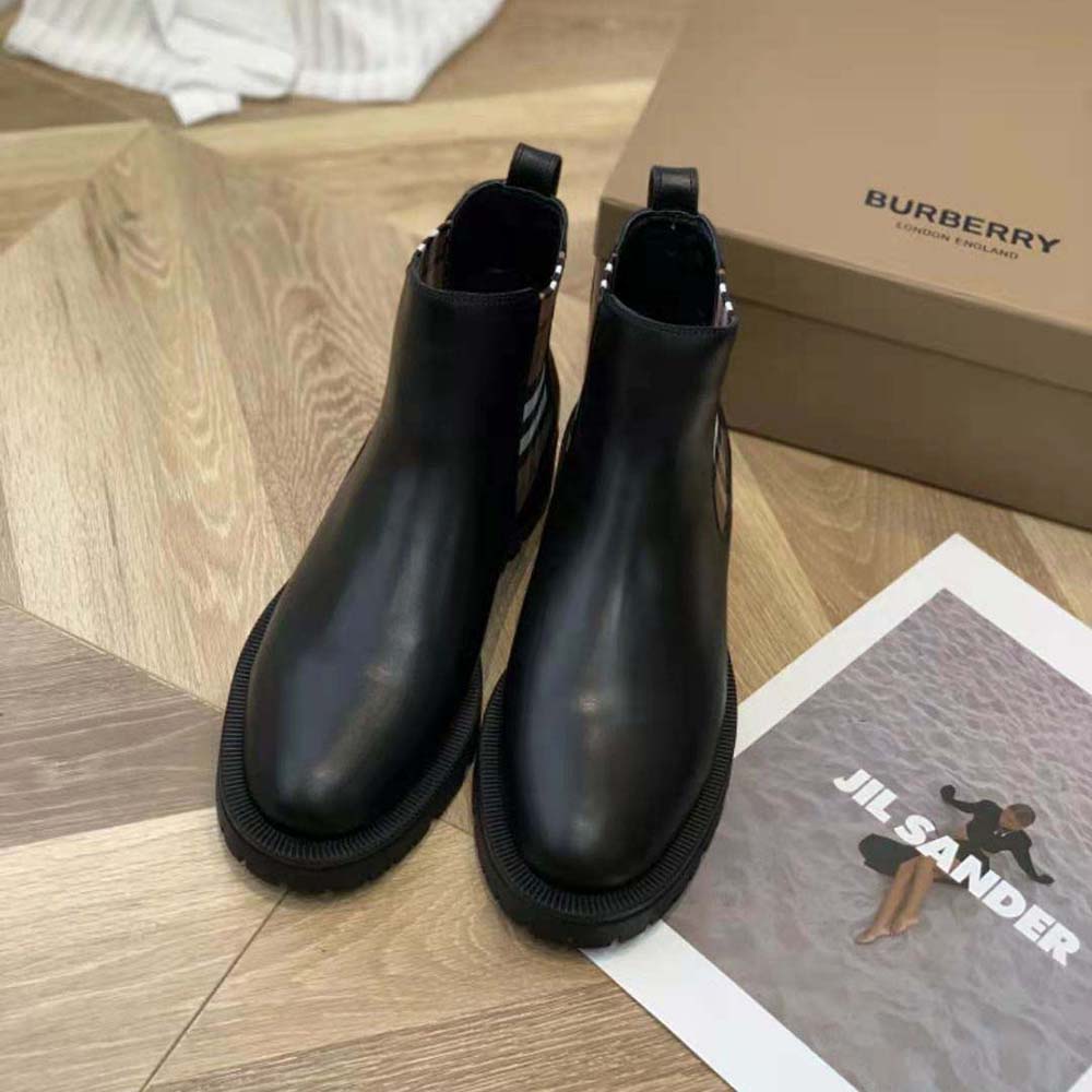 Overhead shot showing black leather and elastic side panels on boots