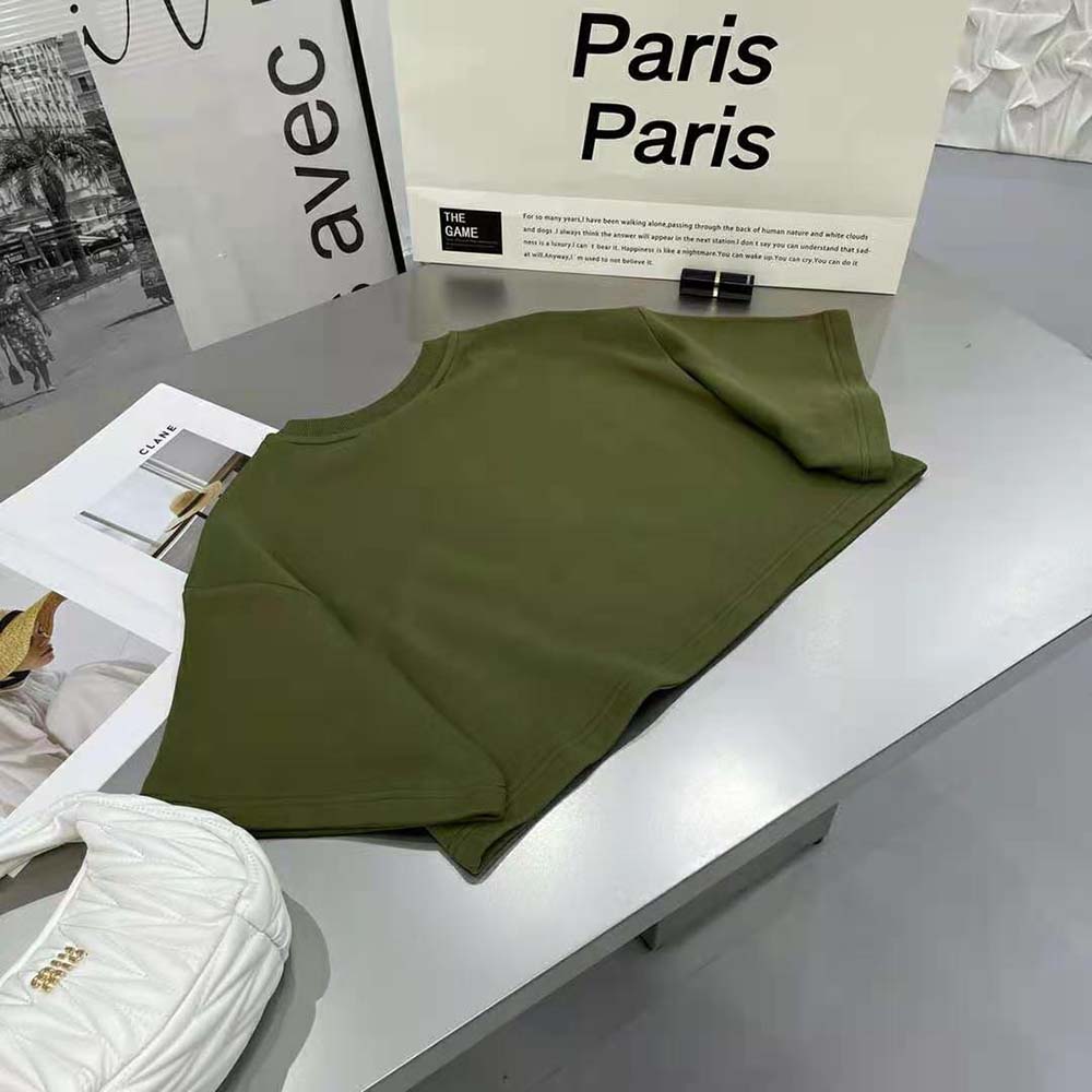 Side angle showing cropped fit and soft texture of Celine T-shirt