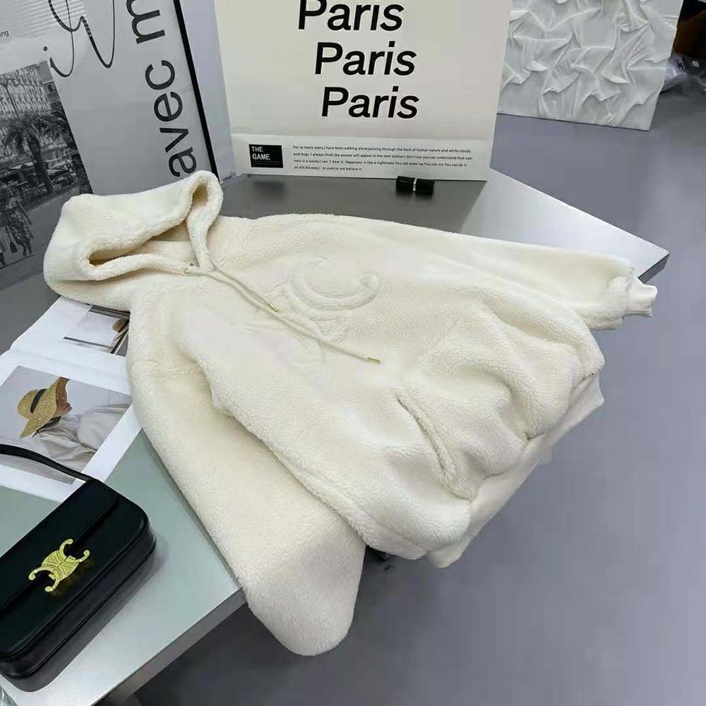 Close-up of embroidered Triomphe detail on Celine oversized hoodie