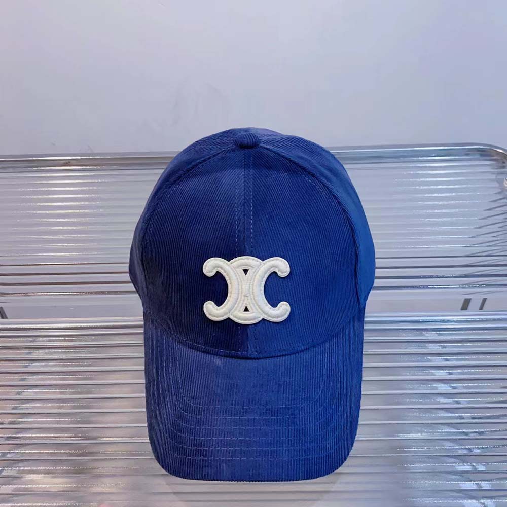Close-up of gold-tone Triomphe hardware on Celine Women Triomphe Cotton Baseball Cap-Blue
