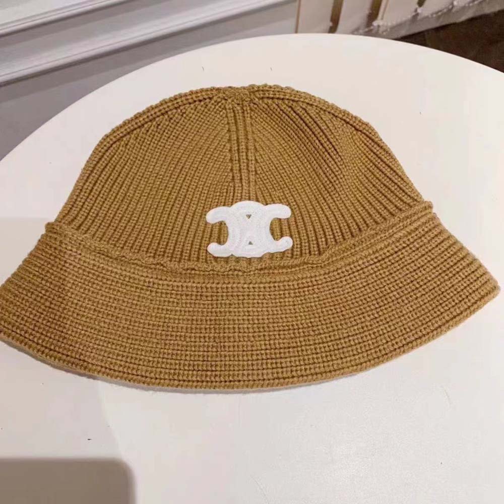 Side angle showcasing seamless cashmere fabric of Celine embroidered beanie