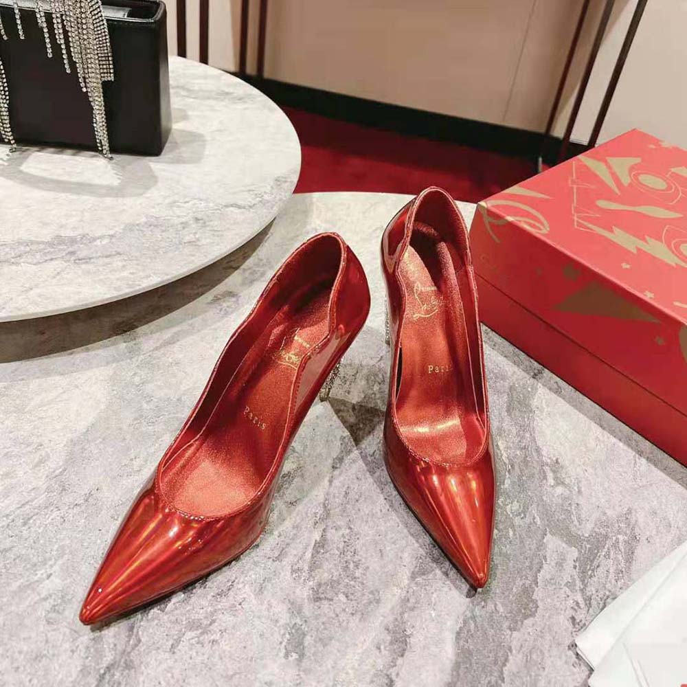 Rear view showing signature red sole of Christian Louboutin Lipstrass Pump