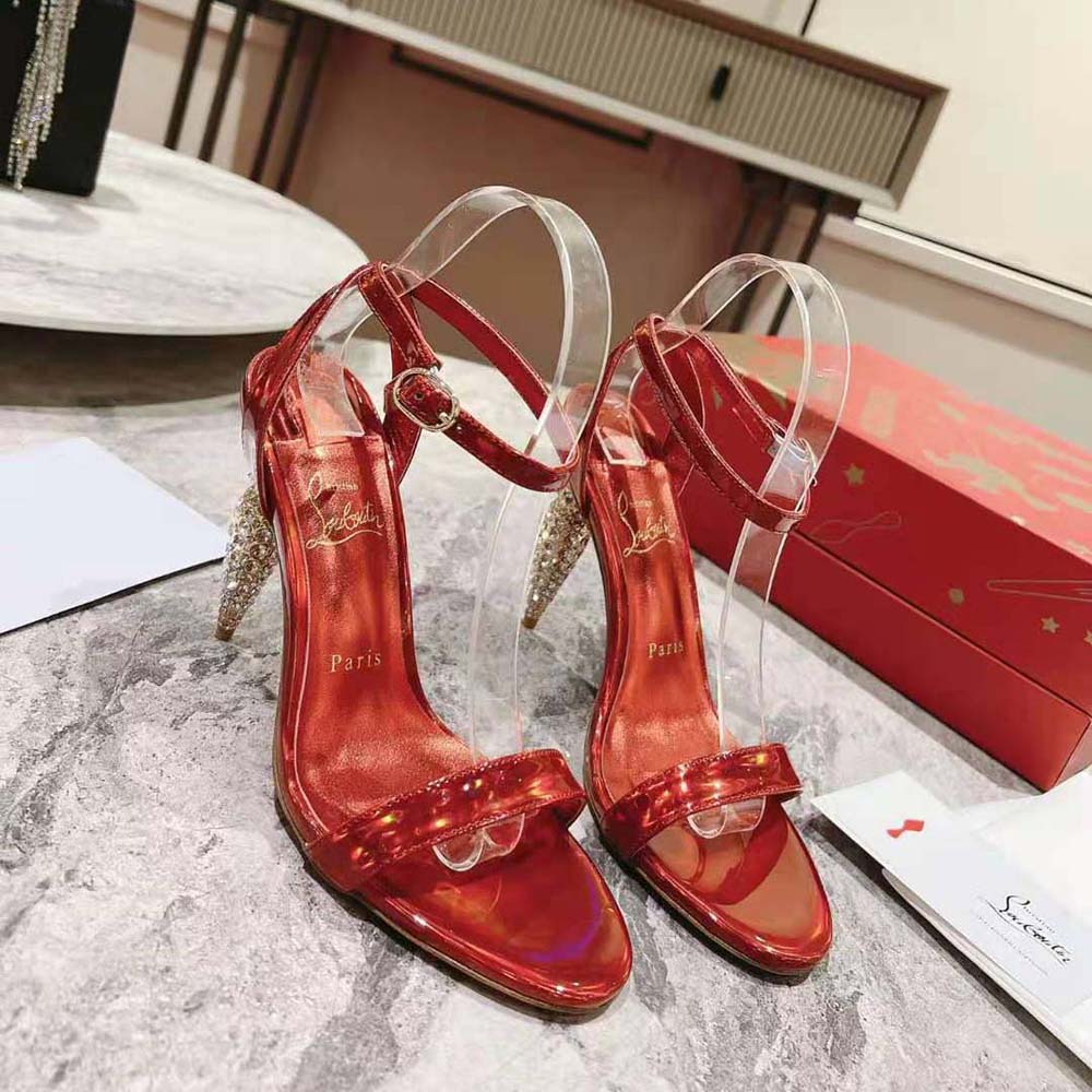 Close-up on red patent leather and sparkling crystals of Lipstrass Queen heels