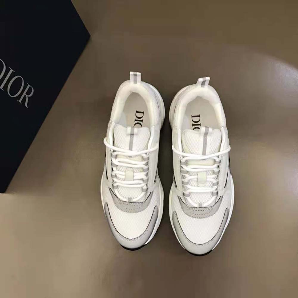 Close-up of silver-tone calfskin detail on Dior Men B22 Sneaker