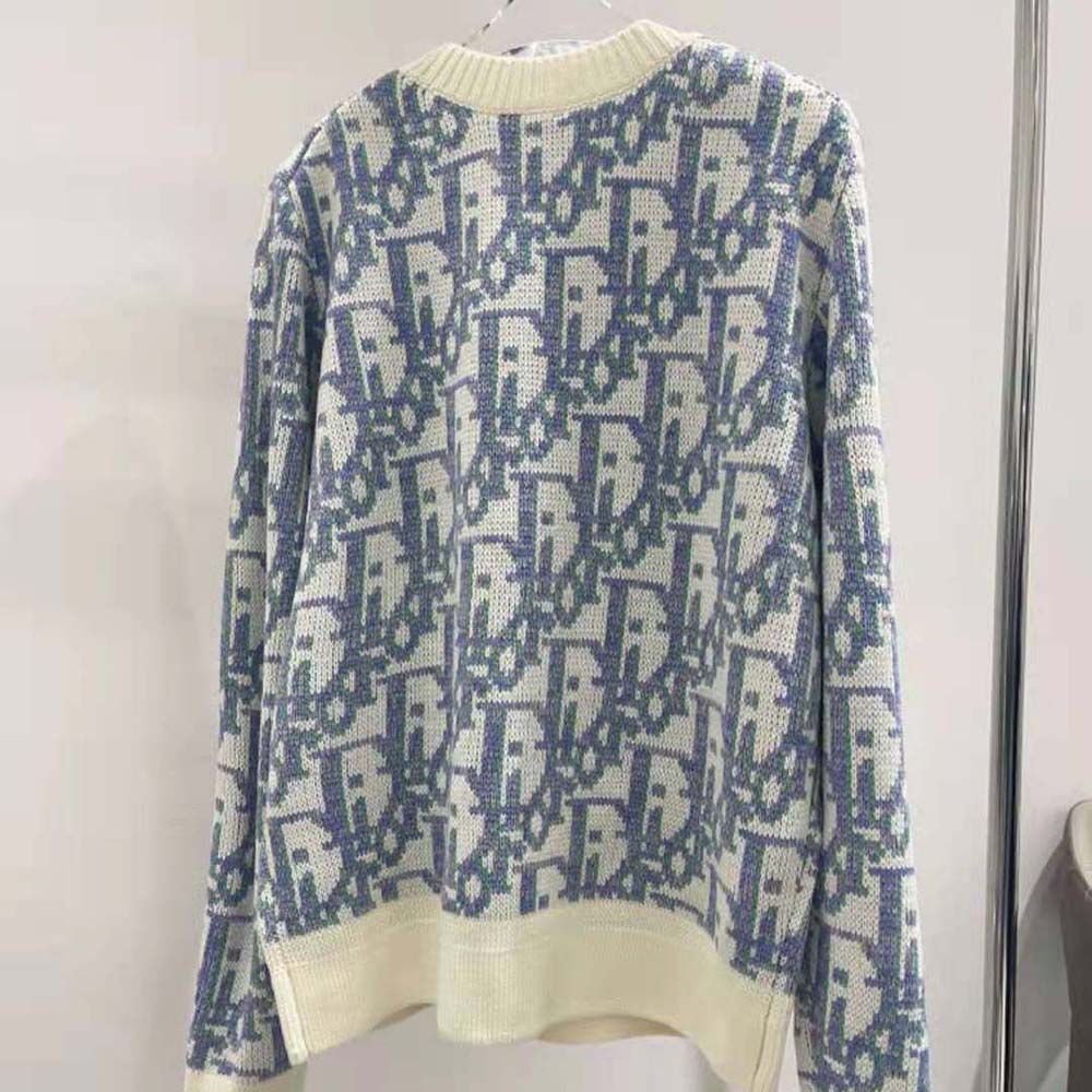 Side angle showing fit of Dior Men Oblique Sweater in wool jacquard
