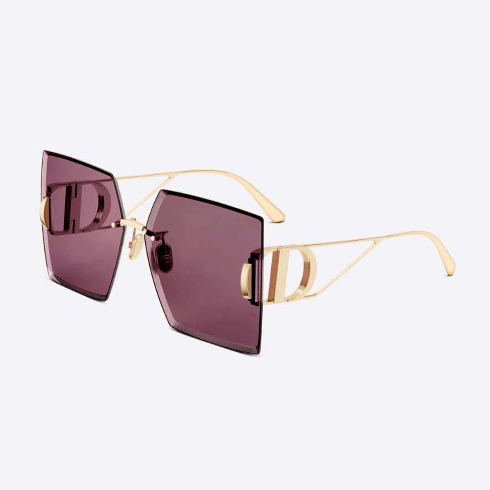 Close-up of gold Dior logo on 30Montaigne S7U Burgundy sunglasses temple