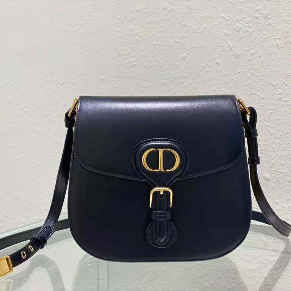 Close-up of gold ‘CD’ clasp on Dior Women Bobby Frame Bag Black Box Calfskin