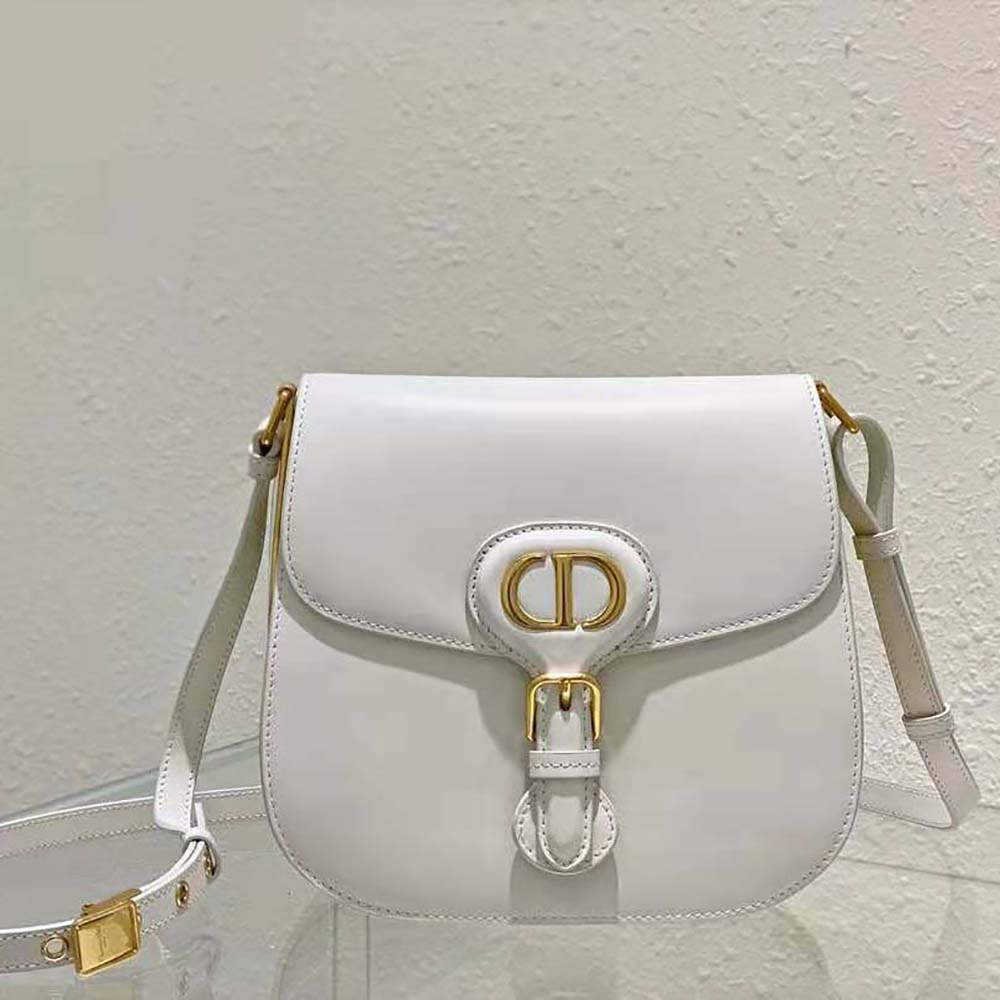 Close-up of gold-tone hardware on Dior Women Bobby Frame Bag Latte Box Calfskin