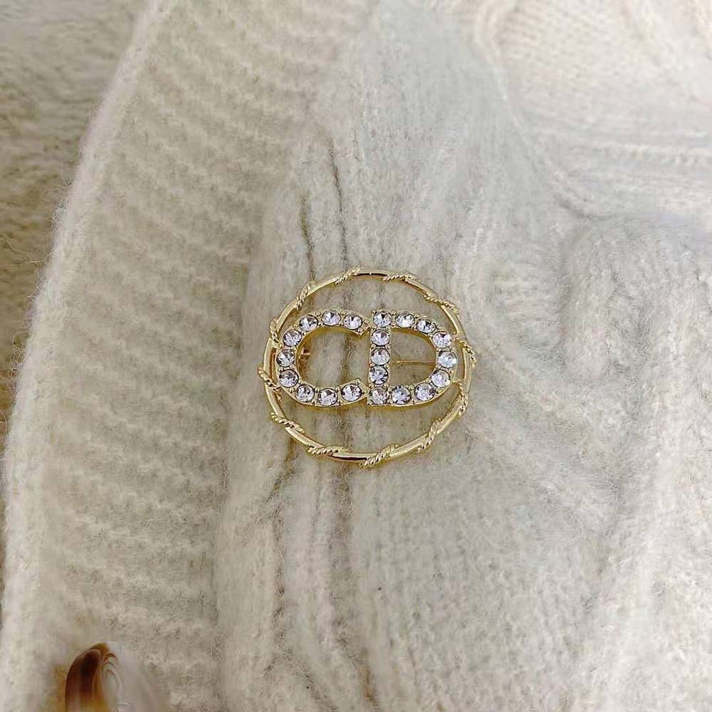 Close-up detail of white crystals on Dior Women Clair D Lune Brooch