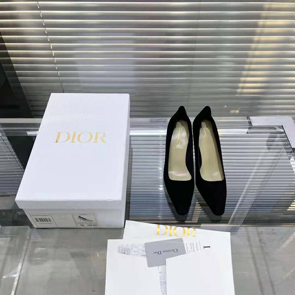 Close-up of Dior metal logo on Black Suede Calfskin pump