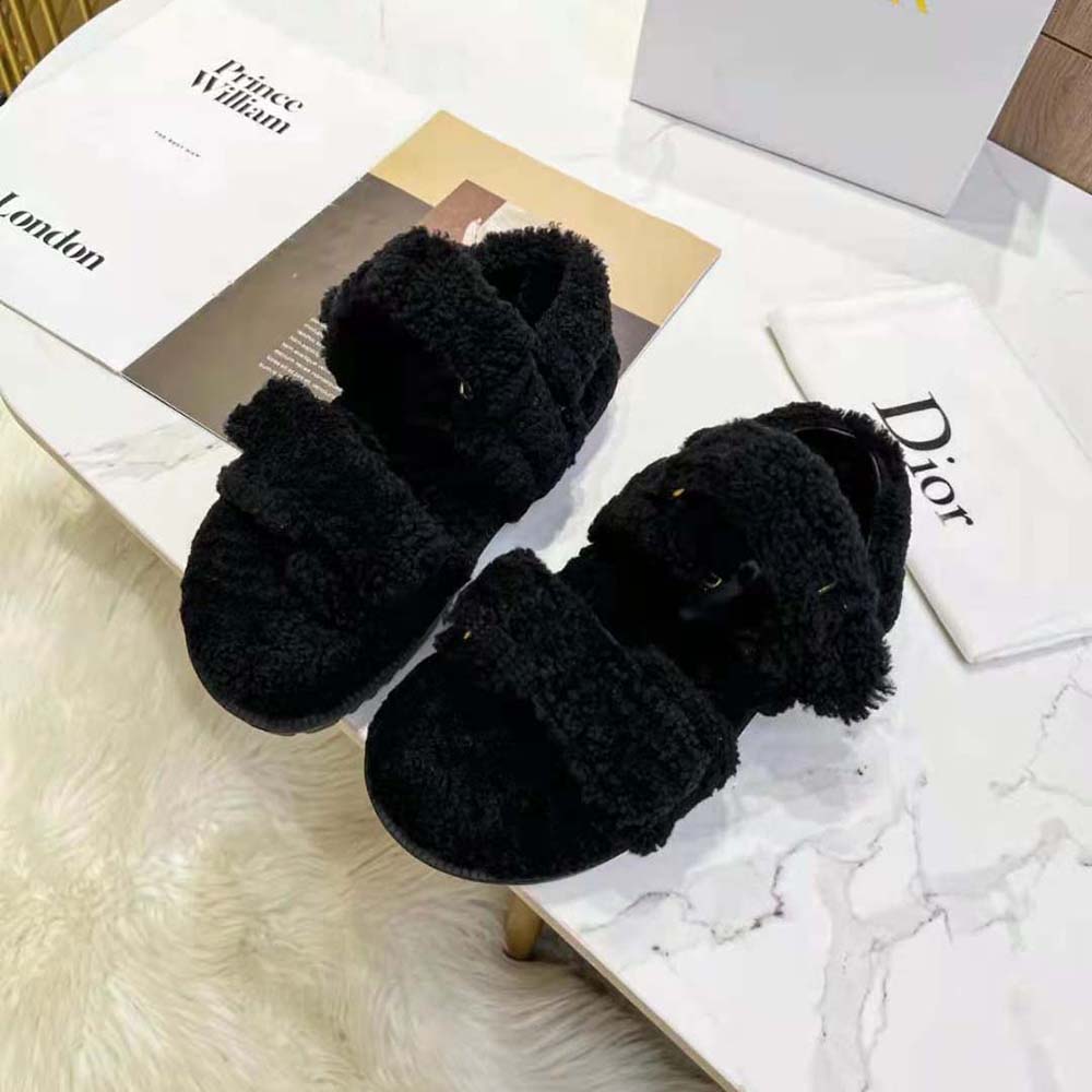 Close-up of buckle and shearling lining on Dioract Sandal Black Shearling