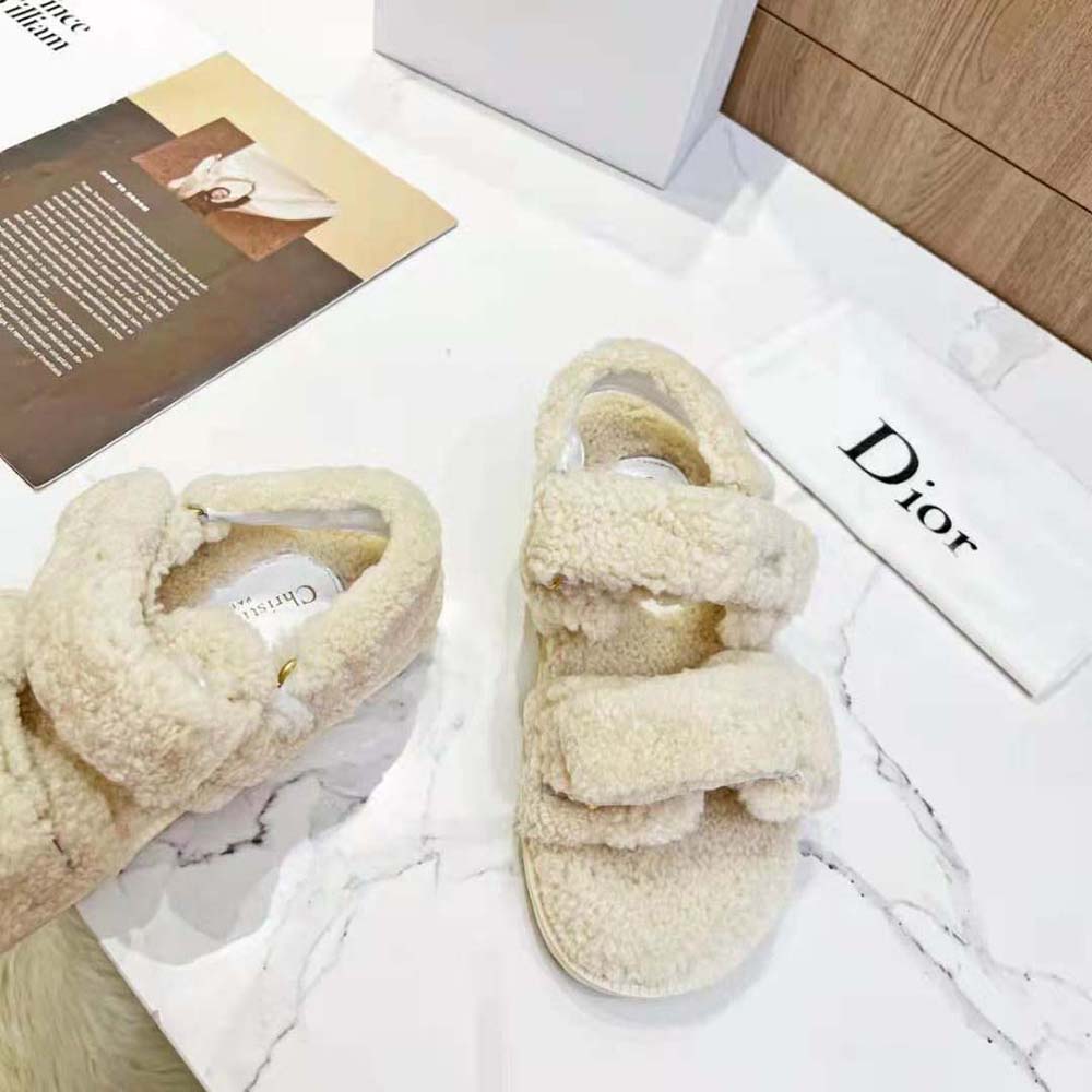 Close-up of brushed metal buckle on Dior Women Dioract Sandal White Shearling