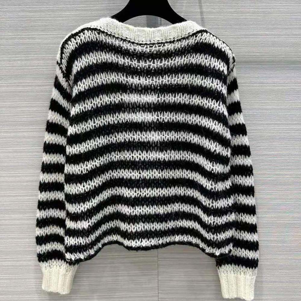 Side angle showing relaxed fit of Dior Women Marinière Sweater with ribbed hem