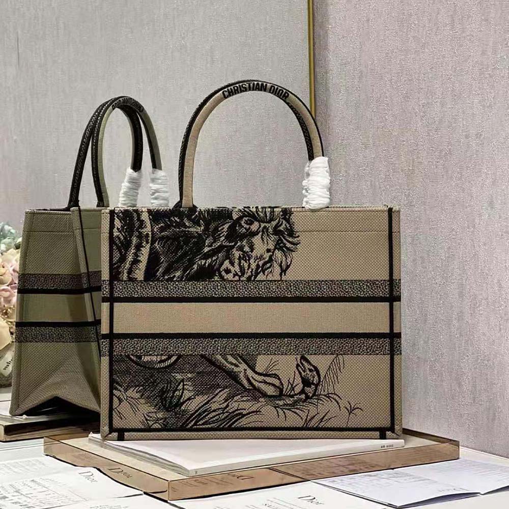 Side angle showing silhouette and handles of Dior Women Medium Dior Book Tote