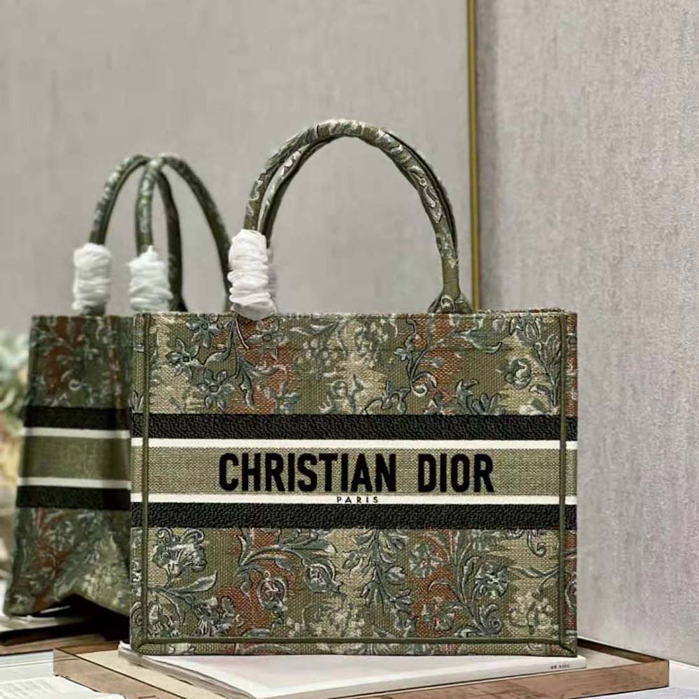Close-up of metallic green brocart embroidery on Dior Women Medium Dior Book Tote