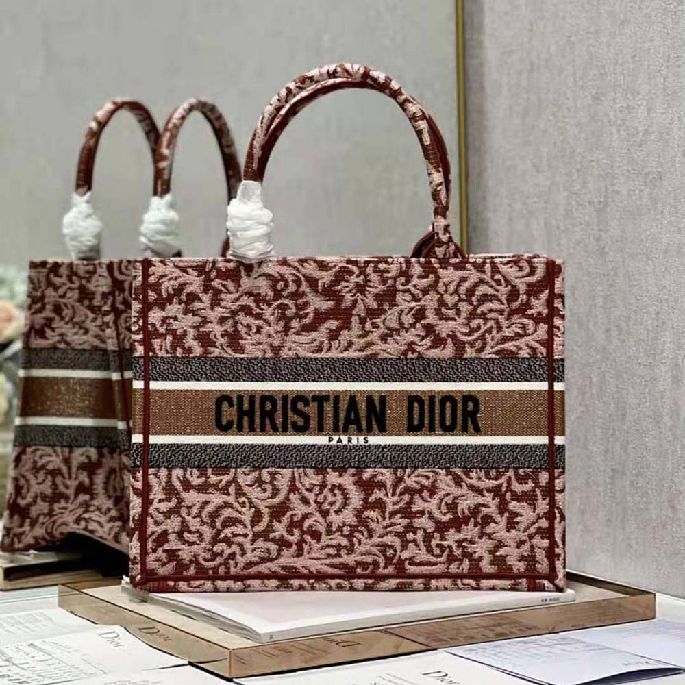 Close-up of metallic pink brocart embroidery detail on Dior Women Medium Dior Book Tote