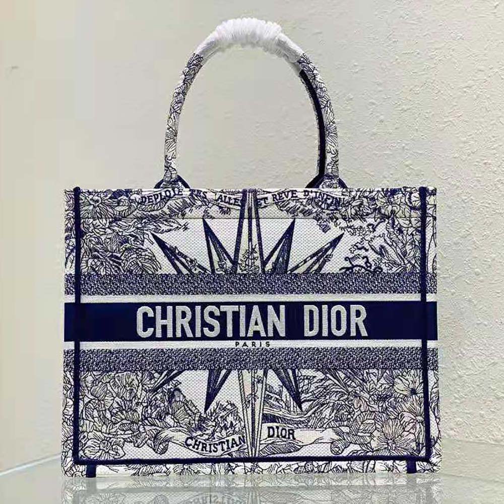 Close-up of embroidery detail on Dior Women Medium Dior Book Tote White and Blue
