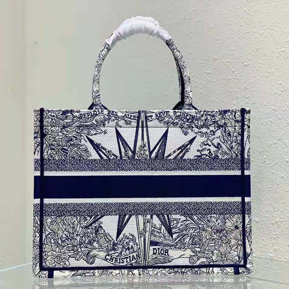 Side angle showing silver hardware on Dior Women Medium Dior Book Tote White and Blue