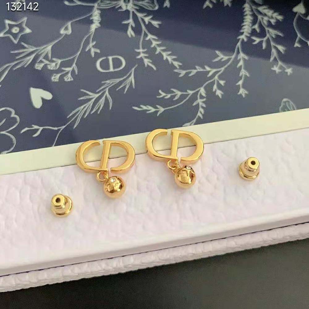 Side angle showing clip closure of Dior Women Petit CD Earrings