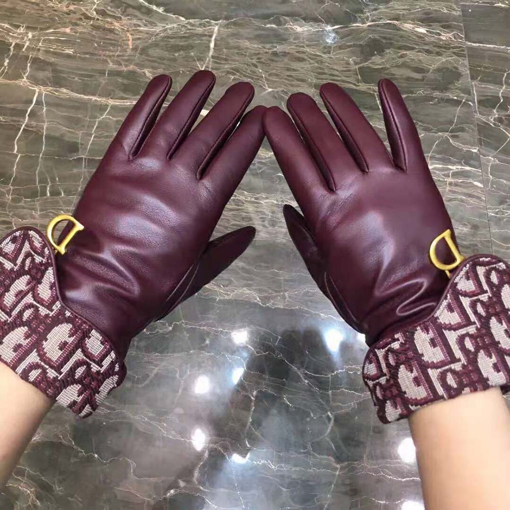 Side angle showing silhouette of Dior Women Saddle Gloves Navy Blue