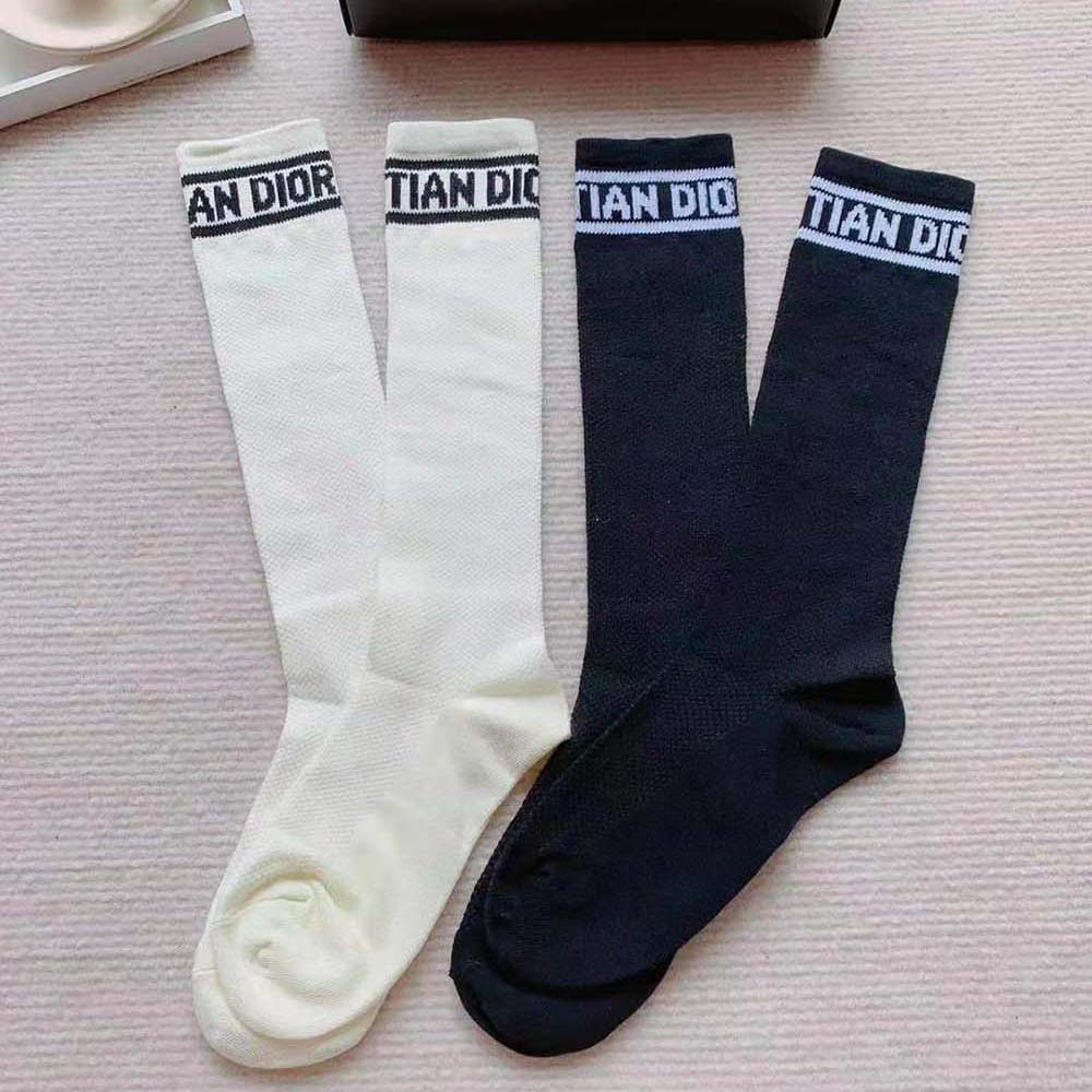 Side angle showing fit and colors of Dior Women Sporty High Socks