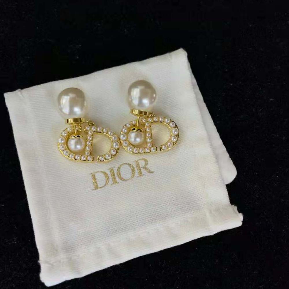 Side view of Dior Women Tribales Earrings showing white resin pearls