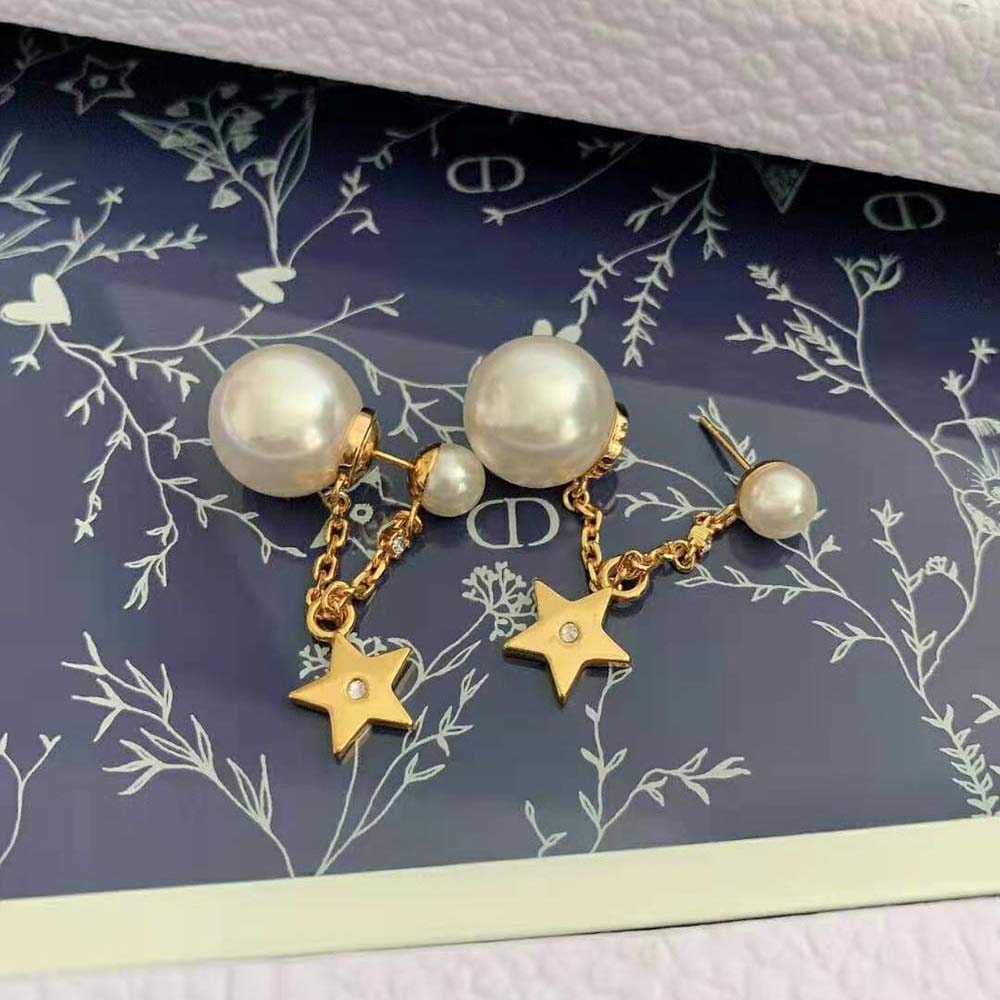 Side angle showing double-sided silhouette of Dior Women Tribales Earrings
