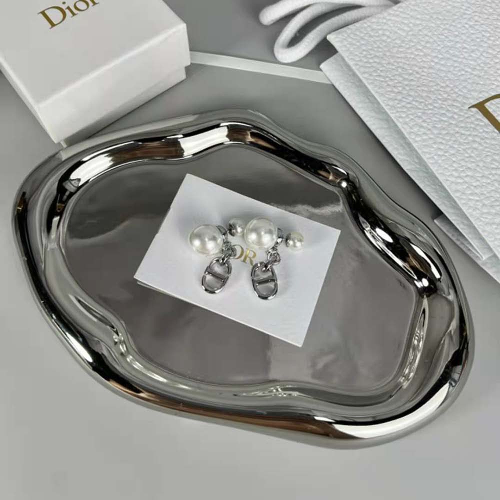 Close-up detail of white resin pearls on Dior Women Tribales Earrings